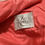 Thumbnail: Close up of clothing tag that says "by Kelle" inside jacket.