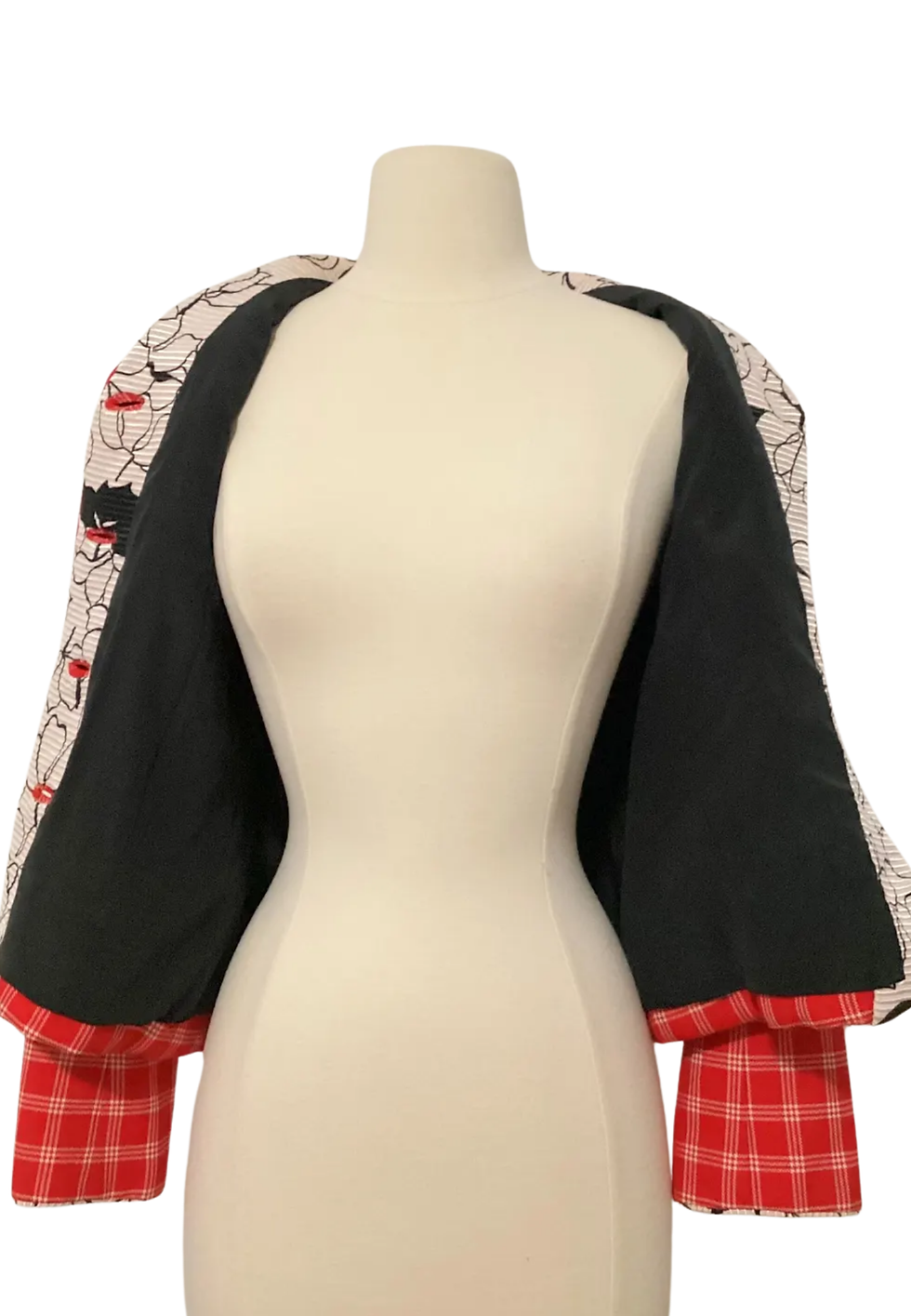 Thumbnail: White jacket with red plaid, black interior, mannequin. Fashion inside view. 