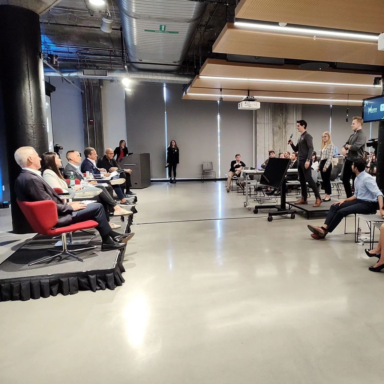 Motit team members pitching at University of Cincinnati's New Venture Championship