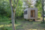 Timbe clad office in woodland setting