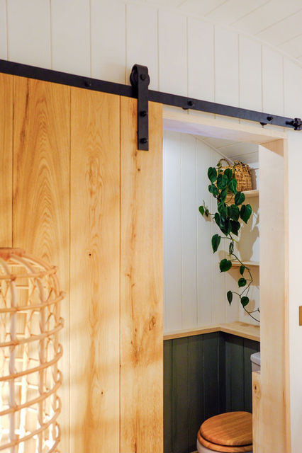 Sliding bathroom door inside shepherd hut.