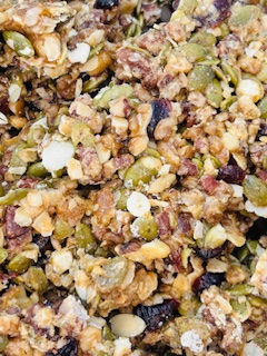 Thumbnail: close up of cluster with textured details of dried fruit andthe sprouted nuts and seeds