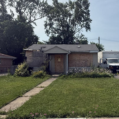 HomeTrade purchased this Chicago property despite fire damage, code violations, and demolition proceedings. The property transferred as-is without repairs.