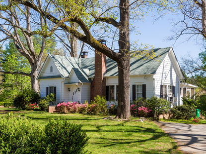 Well-maintained single-family home commonly associated with inherited property sales