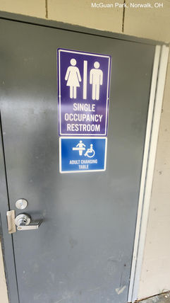 Sign for family restroom with adult or universal changing table