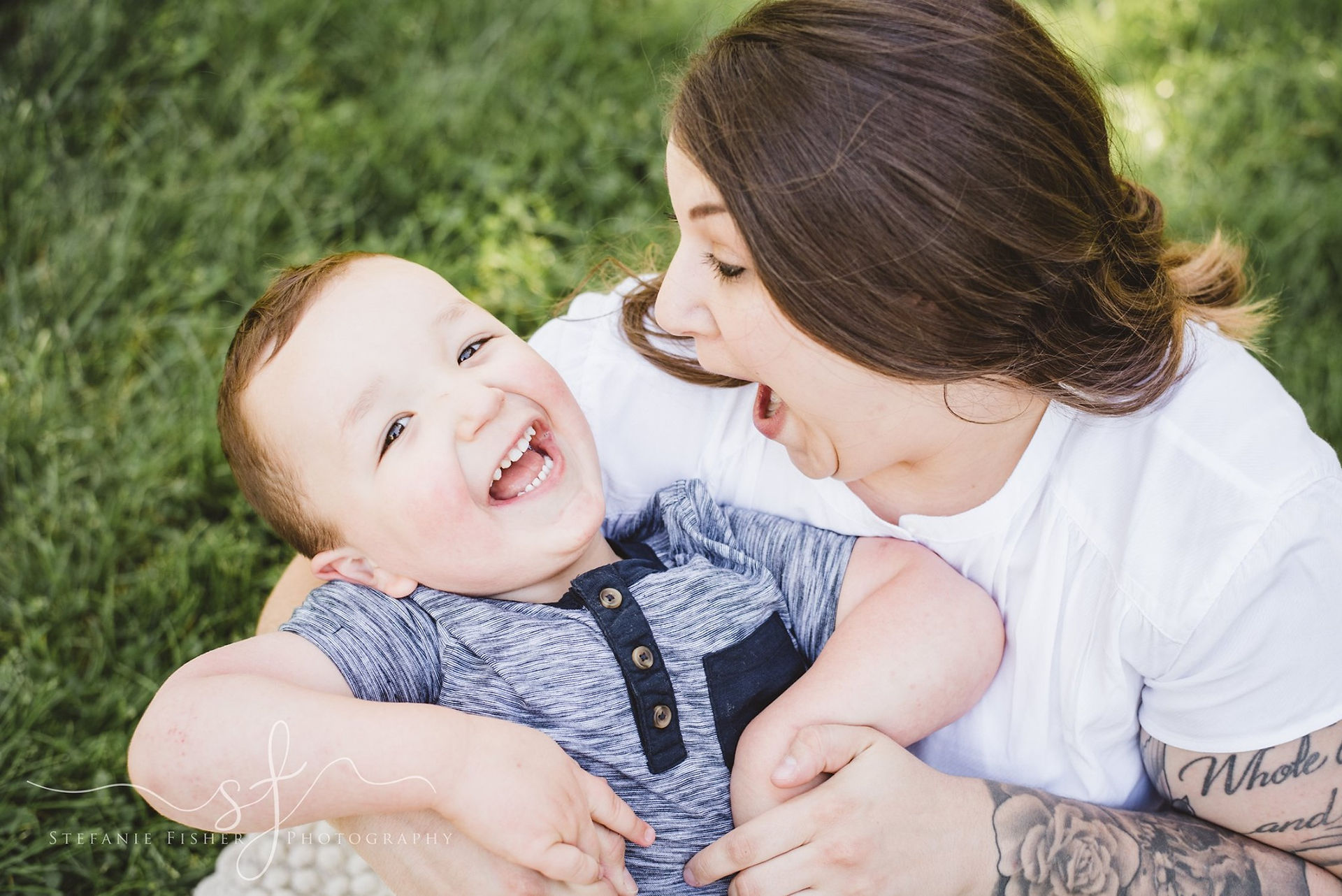 Changing Spaces Indiana mom Krysta smiles at her young son.