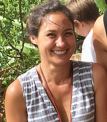 Ka Hana Pono teacher smiling outdoors at the Haleʻiwa campus, representing our caring preschool community.