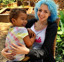 Teacher and child connecting outdoors at Ka Hana Pono Preschool, learning through nature and relationship