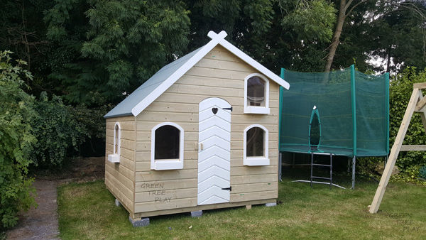 large wooden wendy house with mezzanine floor inside