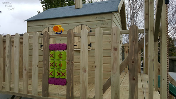 Thumbnail: large wooden playhouse on stilts with 8ft slide, safety stairs, climbing board, 2 swings 277