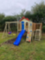 Kids Playhouse with swings and monkey bars