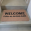 Miniatura: "Welcome Pero No Mucho Rato" - Cool Doormat