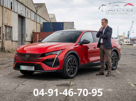 Véhicule Peugeot stationné devant un garage à Marseille 13015