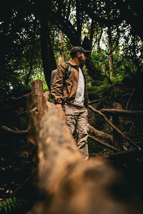 Photograph of explorer in a forest
