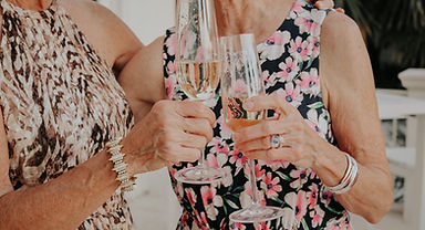 Two women toasting with champagne