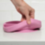 Thumbnail: A hand folding a purple Silicone Leak-Proof Bento Box on a white counter.