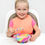 Thumbnail: Smiling girl eating from a colorful bowl with spoon and bib, happy child.