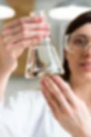 female-scientist-with-safety-glasses-holding-test-tube-lab_23-2148799296.jpg_semt=ais_rp_5