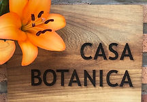 Understated sign in front of Casa Botanica