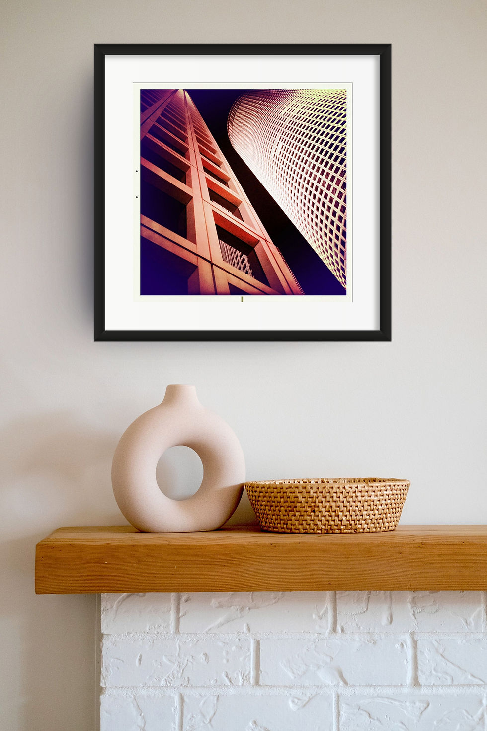 Framed art of Azrieli 2 skyscraper above a mantle