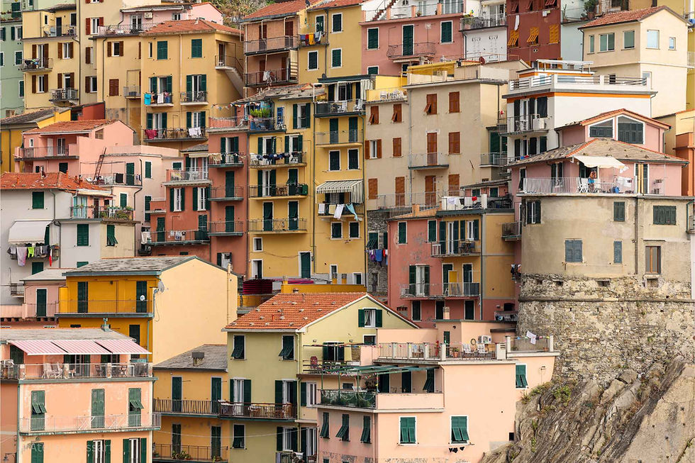 Colorful buildings stacked on a cliffside in Cinque Terre