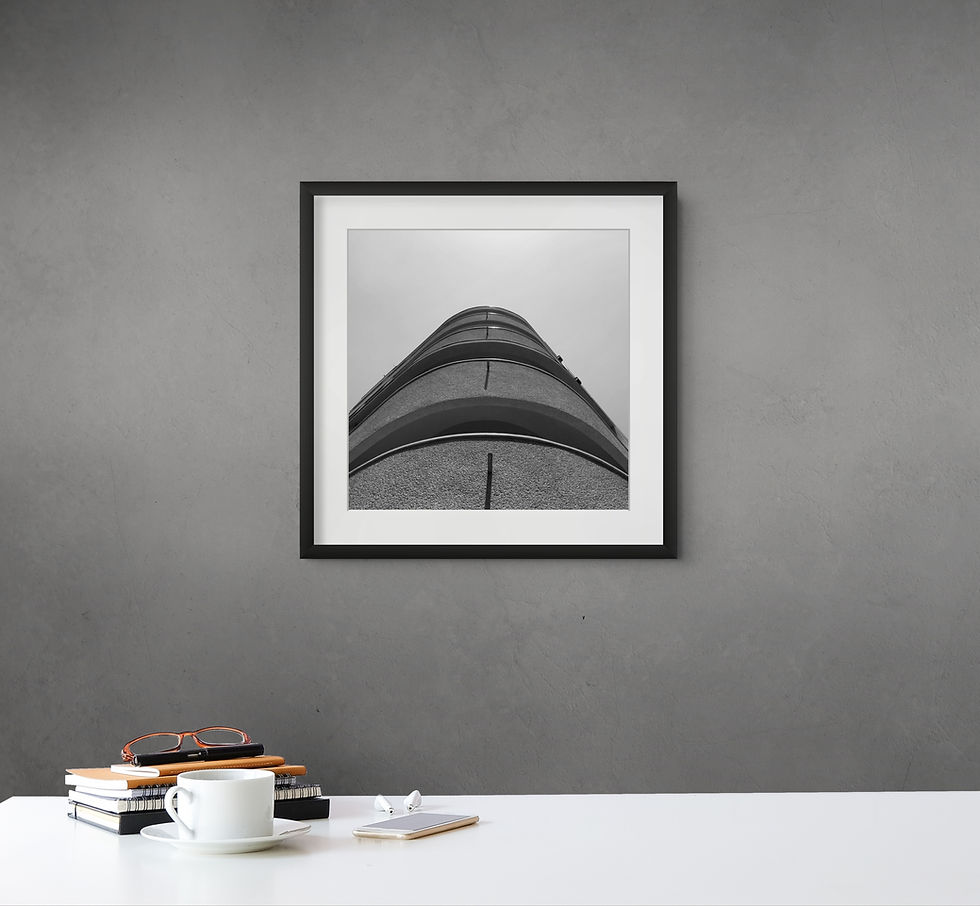Framed Bauhaus architecture print on a grey wall