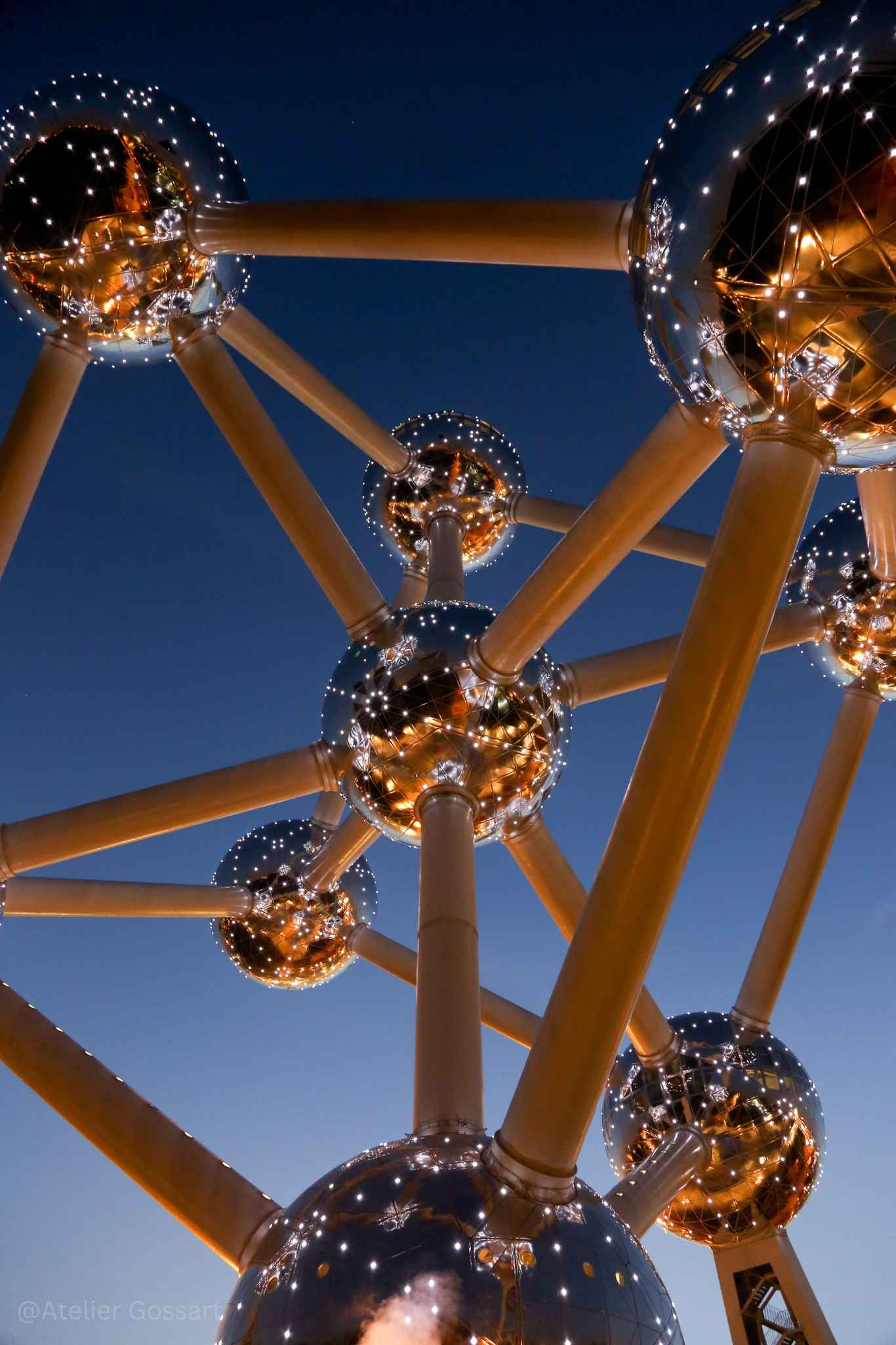 The Atomium's steel spheres against a clear blue sky