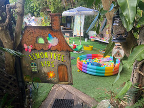 our beautifully hand painted gate where you enter out ball pool and outdoor water play space where you toddlers can enjoy the best things to do in byron bay with kids at Lemontree kids
