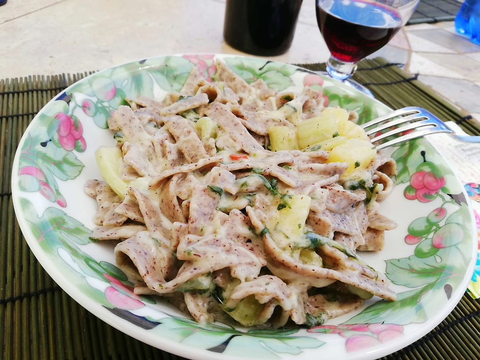 Close up of a traditional Italian dish Pizzoccheri alla Valtellinese