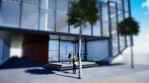 Fachada moderna de vidrio con personas en la entrada