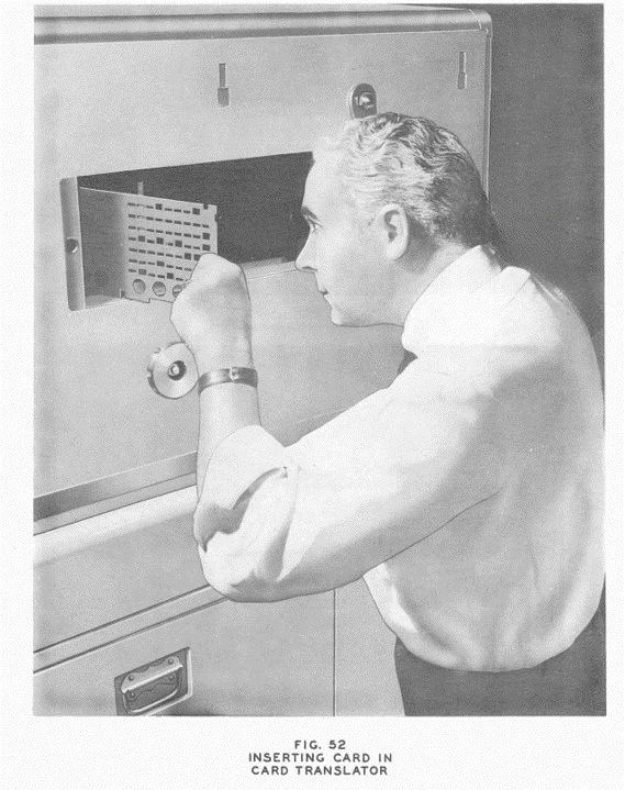 inserting a card into a card transltor cover removed number 4 crossbar toll exchange
