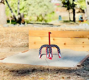 Horseshoe pits at Trinity River Farmhouse for relaxing outdoor games in a beautiful natural setting.