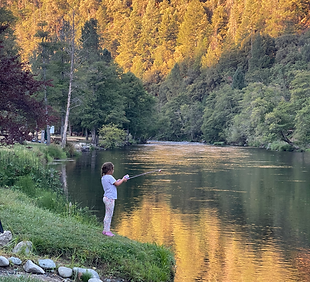 Private river frontage at Trinity River Farmhouse, perfect for fishing and enjoying serene river views.
