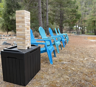 Big Jenga setup at Trinity River Farmhouse for outdoor fun and entertainment by the Trinity River.