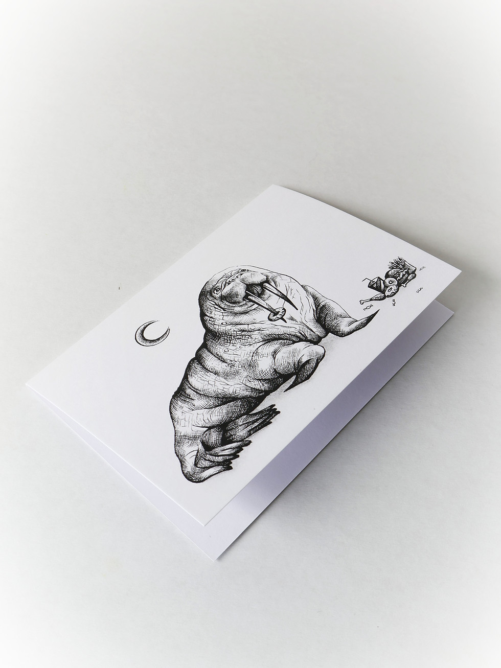A greetings card created by New Zealand Artist Mikayla Forster. The card depicts a walrus with food