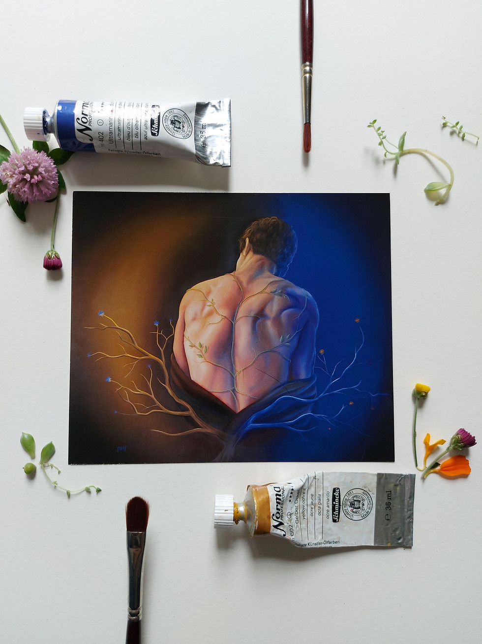 Thumbnail:  A photograph of fine art prints by New Zealand artist Mikayla Forster. This art print depicts a male figure