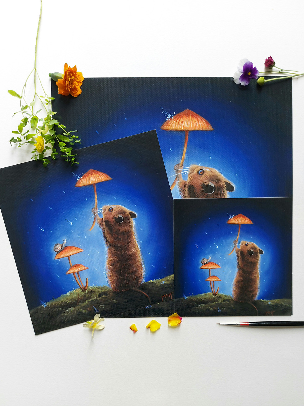 A photograph of fine art prints by New Zealand artist Mikayla Forster. This art print depicts a mouse with mushrooms