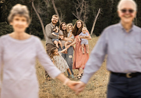 three-generations-family-portrait-holding-hands.jpg