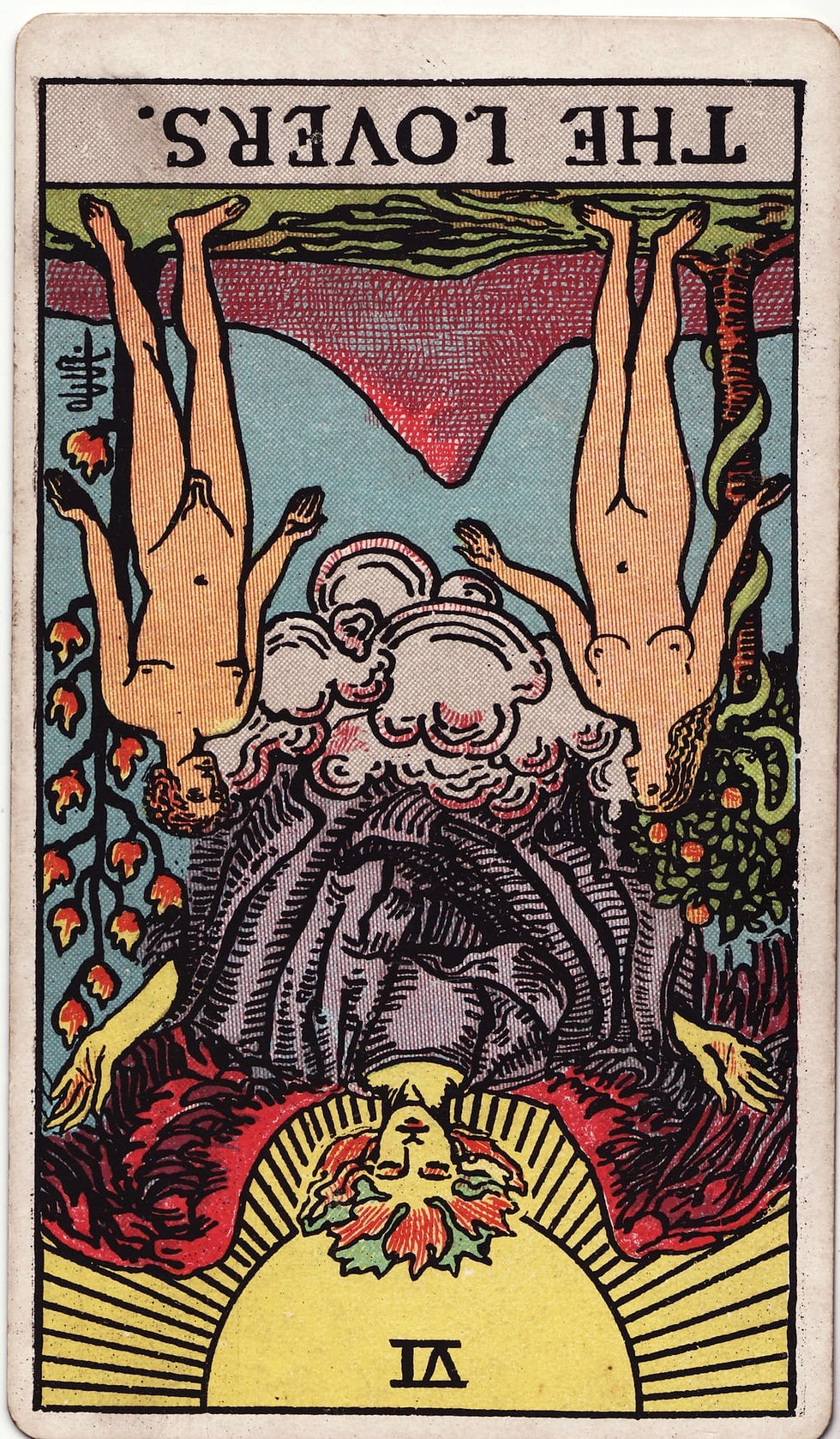 Close-up of The Lovers card from the Rider Waite Tarot deck illustrating symbolism of choice, intuition and relationships.