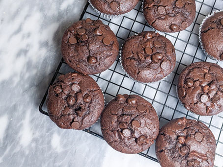 Mini double chocolate muffins on a cooling rack