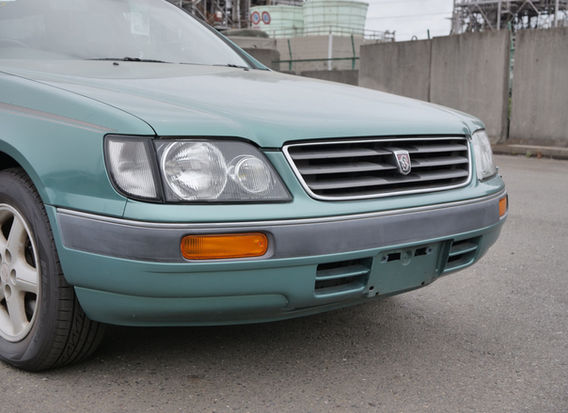 1997 Nissan Stagea 25X wagon in original green with 10k miles showing front exterior, factory alloy wheels, automatic transmission and exceptionally preserved condition
