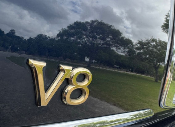 Rear trunk badging photos showing gold badges of a 2000 Toyota Crown Type C
