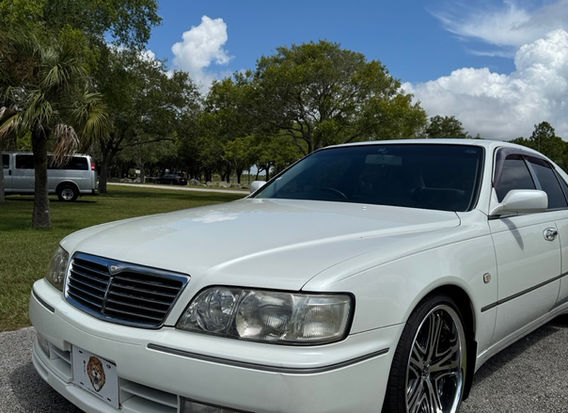 Front angle of 1997 Nissan Cima Turbo – Japanese VIP sedan with V6 engine, for sale in the USA
