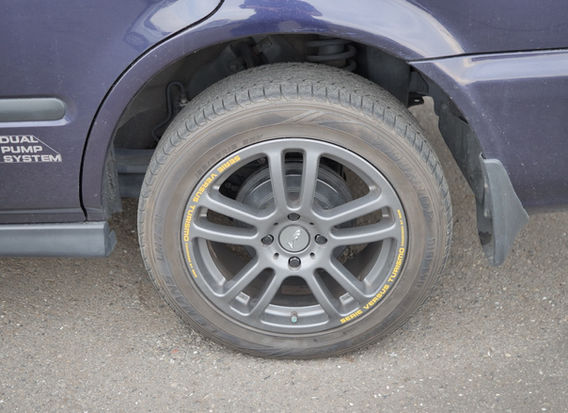 Side profile of 1996 Honda Orthia 2.0GX 4WD in original navy with alloy wheels and clean body lines.