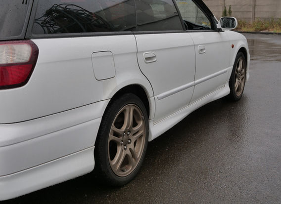Right side of 1999 Subaru Legacy Wagon GT-B E-Tune – twin-turbo AWD Japanese wagon with half-leather sport seats