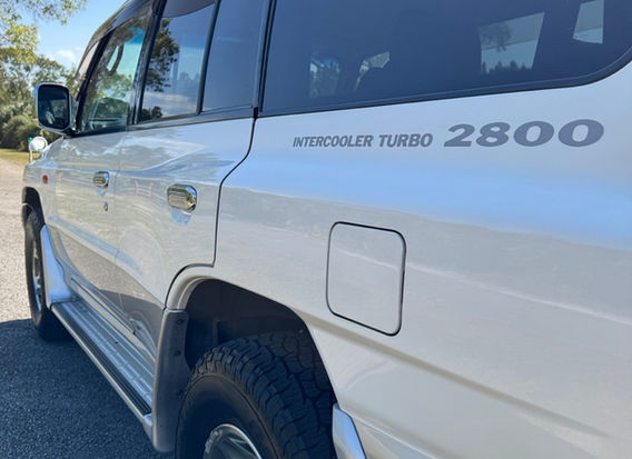 1997 Mitsubishi Pajero GX JDM SUV for sale—powered by a turbo diesel engine, 4WD, and rugged off-road capability.
