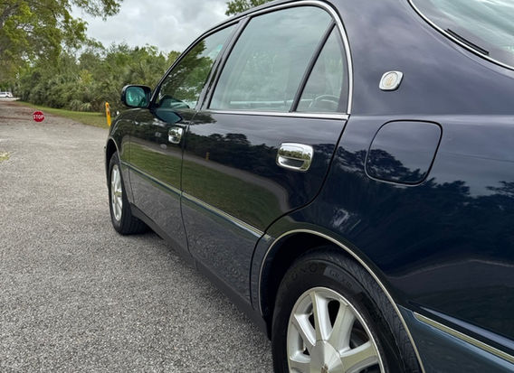 Side panel view of 2000 Toyota Crown Majesta C Type VIP style JDM luxury sedan