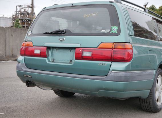 Rear view of 1997 Nissan Stagea 25X JDM wagon original green paint low mileage 10k miles