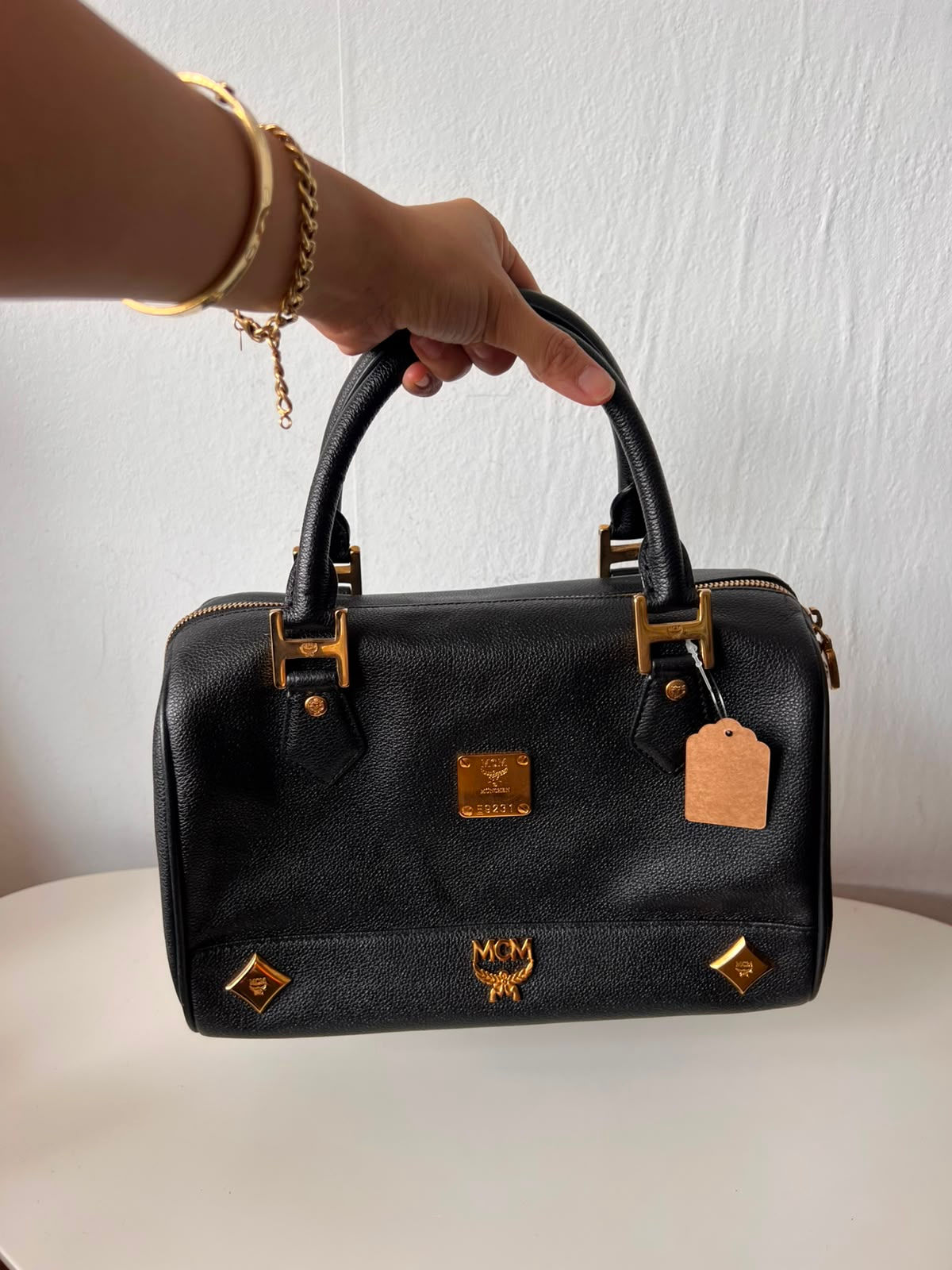 MCM Black Leather Boston Handbag with Gold-Tone Hardware