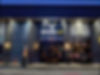 Restaurant entrance, outdoors at night